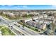 A high aerial view of houses and a 4 lane road and intersection at 8613 N Meridian St, Indianapolis, IN 46260