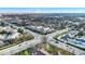 An aerial view featuring townhomes located at an intersection with bustling traffic at 8613 N Meridian St, Indianapolis, IN 46260