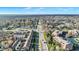 Aerial view showcasing the neighborhood and surrounding trees at 8613 N Meridian St, Indianapolis, IN 46260