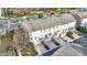 Aerial view showcases townhomes with balconies, garages, and convenient street access at 8613 N Meridian St, Indianapolis, IN 46260