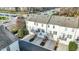 Aerial view of townhomes featuring balconies and garages offers a glimpse into community living at 8613 N Meridian St, Indianapolis, IN 46260