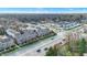 Aerial community view includes townhomes, landscaping, and easy access to local amenities at 8613 N Meridian St, Indianapolis, IN 46260