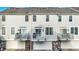 Three-story townhomes with private balconies and garages provide modern and convenient living at 8613 N Meridian St, Indianapolis, IN 46260