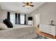Tranquil main bedroom with a comfortable bed, neutral decor, and modern furnishings at 8613 N Meridian St, Indianapolis, IN 46260