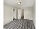 This bedroom features two walk-in closets, a ceiling light, and plush carpeting, creating a functional and stylish space at 10719 Crackling Dr, Indianapolis, IN 46259