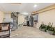 Unfinished basement space features tiled flooring, utility appliances, and ample room for storage and customization at 10821 Club Point Dr, Fishers, IN 46037