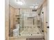 Modern bathroom featuring a glass shower, decorative tile accents, and a sleek, neutral color palette at 10821 Club Point Dr, Fishers, IN 46037