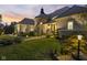 Gorgeous home exterior is enhanced by the lush landscaping and exterior stone accents at 10821 Club Point Dr, Fishers, IN 46037