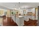 Gourmet kitchen featuring custom cabinetry, granite countertops, and stainless steel appliances, perfect for culinary enthusiasts at 10821 Club Point Dr, Fishers, IN 46037