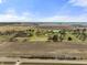 Aerial view of farmland with approximate property lines marked in yellow showing home against a blue sky at 11686 S 825 W, Edinburgh, IN 46124