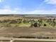 Aerial view of farmland with approximate property lines marked in yellow with trees against a blue sky at 11686 S 825 W, Edinburgh, IN 46124
