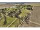 Aerial photograph of a serene rural property with lush fields and a tranquil pond at 11686 S 825 W, Edinburgh, IN 46124