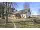 Expansive backyard view featuring a cozy covered porch and mature trees at 11686 S 825 W, Edinburgh, IN 46124