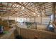 Large barn area with hay bales, an ATV, and natural lighting at 11686 S 825 W, Edinburgh, IN 46124