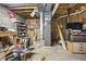 Unfinished basement with tool boxes, shelving, and exposed HVAC at 11686 S 825 W, Edinburgh, IN 46124