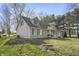 Attractive home exterior showcasing green shutters and lush, green lawn at 11686 S 825 W, Edinburgh, IN 46124