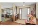 Bright foyer featuring tile floors, a staircase, and a living room at 11686 S 825 W, Edinburgh, IN 46124