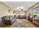 Cozy living room featuring comfortable seating, a fireplace, and decorative accents at 11686 S 825 W, Edinburgh, IN 46124