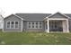 Well-maintained backyard with a covered patio and exterior view of the home at 1274 Clairet, Westfield, IN 46074