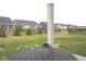 Community backyard view featuring a covered patio and row of houses at 1274 Clairet, Westfield, IN 46074