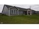 Large backyard with well-maintained lawn and covered patio at 1274 Clairet, Westfield, IN 46074