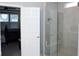 A glass shower is visible from this main bedroom suite in this open concept bathroom at 1274 Clairet, Westfield, IN 46074