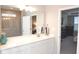 Bright bathroom with a double vanity, quartz countertops, and a glass-enclosed shower with white tile at 1274 Clairet, Westfield, IN 46074