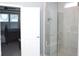 Contemporary bathroom with walk-in shower, beige tiling, and neutral color palette at 1274 Clairet, Westfield, IN 46074