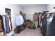 Walk-in closet with abundant hanging space, shelving, and plenty of room for storage at 1274 Clairet, Westfield, IN 46074