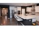 Open-concept kitchen with stainless steel appliances, white cabinetry, and ample counter space at 1274 Clairet, Westfield, IN 46074
