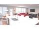Open-concept living space with view from kitchen, featuring a dining area and cozy seating at 1274 Clairet, Westfield, IN 46074