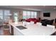 Open-concept living space with a kitchen island, comfortable seating, and lots of natural light at 1274 Clairet, Westfield, IN 46074