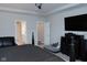 Spacious main bedroom with black furnishings, including a bed, dressers and a mounted TV at 1274 Clairet, Westfield, IN 46074