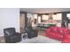Open-concept living space featuring a kitchen, dining area, and living room with hardwood floors at 1274 Clairet, Westfield, IN 46074