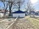 View of backyard with detached two-car garage at 1425 N Lasalle St, Indianapolis, IN 46201
