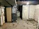 Spacious basement with heater, exposed piping and concrete floor at 1425 N Lasalle St, Indianapolis, IN 46201