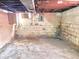 Unfinished basement space with concrete walls and floor for renovation at 1425 N Lasalle St, Indianapolis, IN 46201