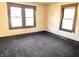 Bedroom with well-lit windows at 1425 N Lasalle St, Indianapolis, IN 46201