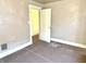 Bedroom with view to open door and neutral color carpet at 1425 N Lasalle St, Indianapolis, IN 46201