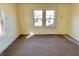 Sunlit bedroom with neutral tones and ample window light at 1425 N Lasalle St, Indianapolis, IN 46201