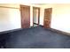 Bedroom featuring dark trim and multiple doorways at 1425 N Lasalle St, Indianapolis, IN 46201