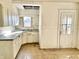 Traditional kitchen offers plenty of storage and natural light at 1425 N Lasalle St, Indianapolis, IN 46201