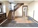 Living room featuring open layout, staircase, and natural light at 1425 N Lasalle St, Indianapolis, IN 46201