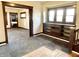 Living room showcasing archway details, built-in shelving, and ample natural light at 1425 N Lasalle St, Indianapolis, IN 46201