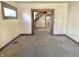 Bright living room highlighting natural light and archway access to other rooms at 1425 N Lasalle St, Indianapolis, IN 46201