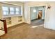 Bright living room features built-in shelving and large window at 1425 N Lasalle St, Indianapolis, IN 46201