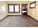 Living room showcasing hardwood trim, natural light, and original details at 1425 N Lasalle St, Indianapolis, IN 46201