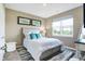 Inviting bedroom with large window, complemented by elegant decor and soft lighting at 1684 Beach St, Greenwood, IN 46143