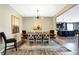 Dining room area featuring an open concept and view of kitchen and dining table at 1684 Beach St, Greenwood, IN 46143