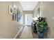 A bright hallway with wood floors, neutral paint, and decor at 1684 Beach St, Greenwood, IN 46143